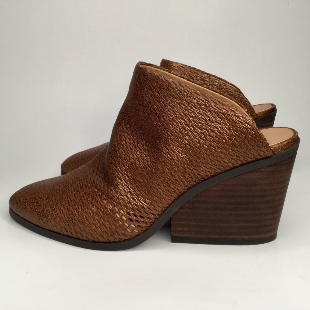 Lucky Brand perforated leather upper bronze mules.
